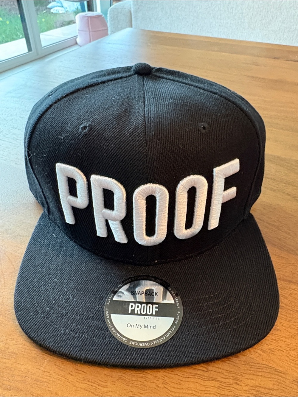 PROOF Black Snapback Hat with White Embroidered Logo